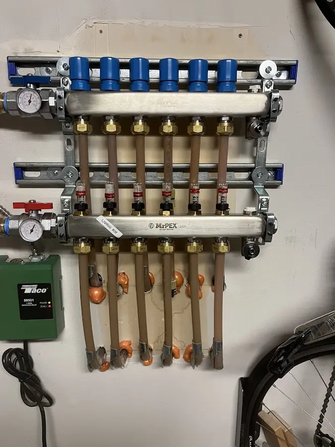 Plumber performing Leak Detection at a residential property in Chevy Chase